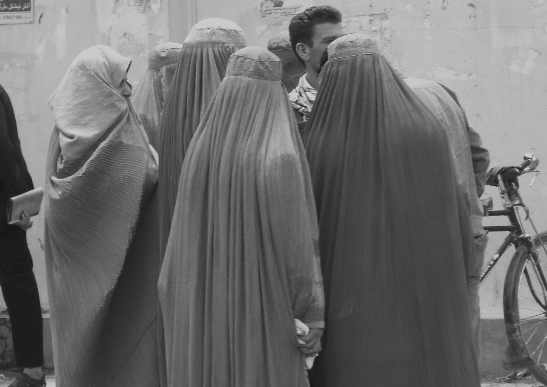 Afghan Women standing in village